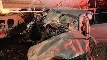 Driver critically injured when car collides with train